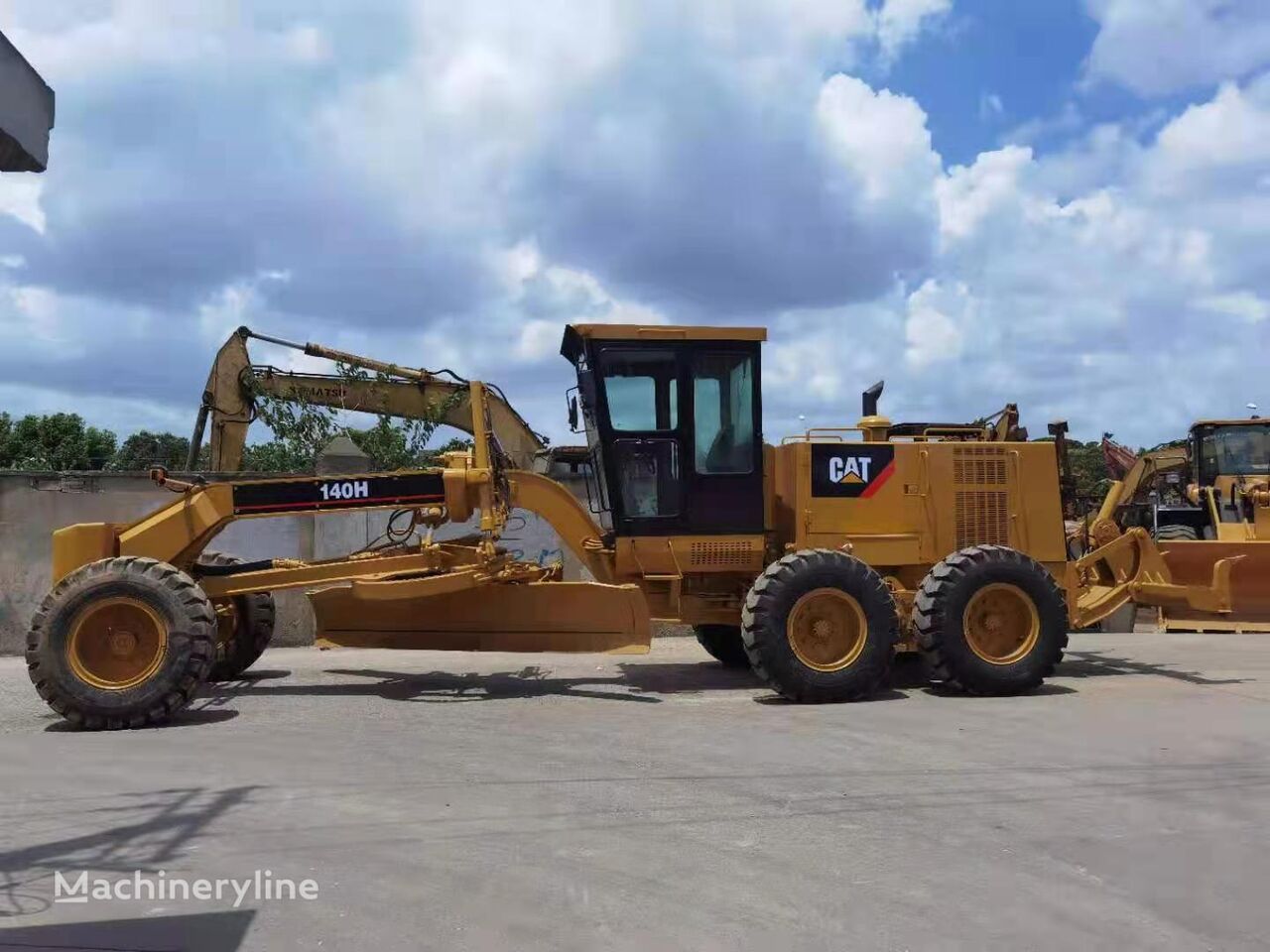 грейдер Caterpillar 140H