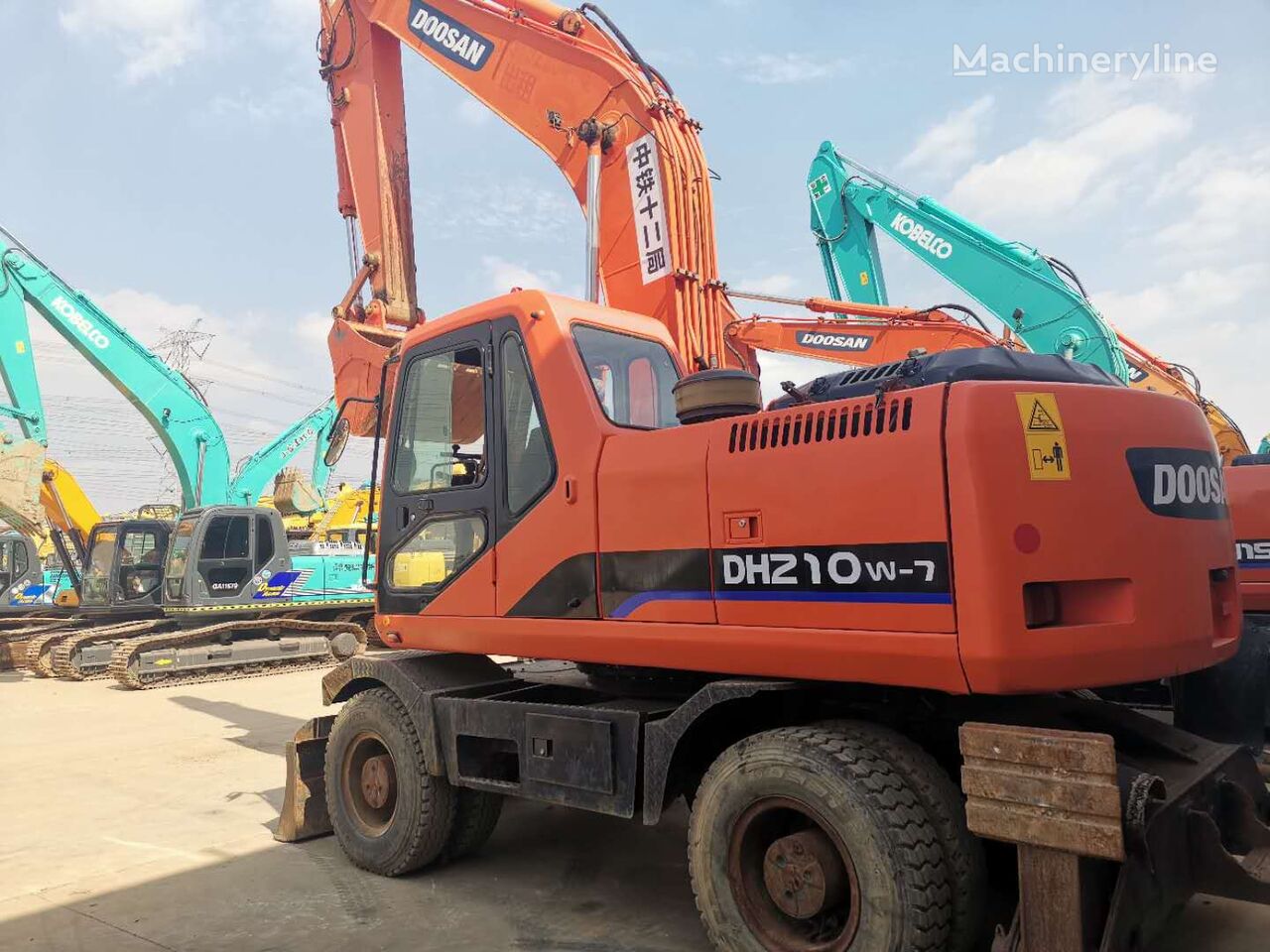 колесный экскаватор Doosan DH210W